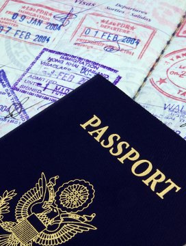 U.S. Passport full of travel visas and entry stamps.