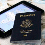United States ePassport and tablet on table.