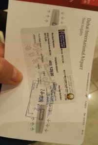 a stamped eVisa printout from Dubai International Airport