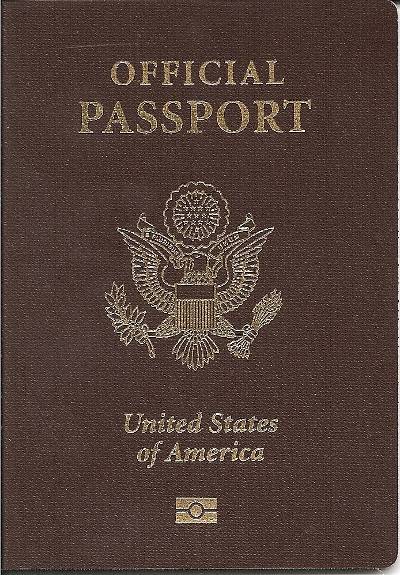 Official U.S. passport with brown cover.