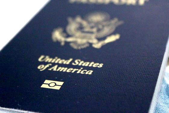 Close up of front cover of blue United States passport book
