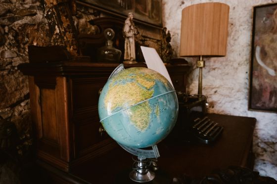 A globe on a desk showing Africa