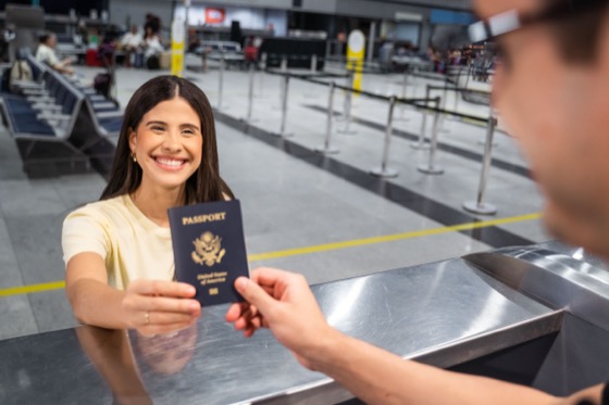 Passport Service brings smile to woman traveler
