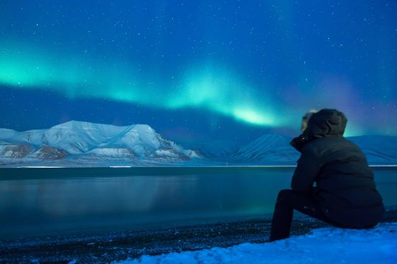 view of Northern Lights over Alaska glaciers and water