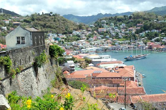 Sailing Yacht in small bay of Caribbean island of Dominica.