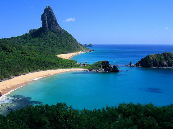 Secluded beaches and lush green vegetation on Fernando de Noronha island.