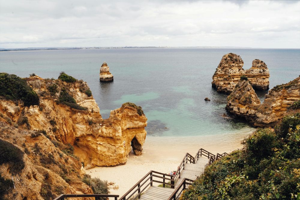 Scenic beach and rock cliffs in Lagos, Portugal