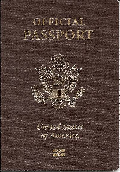 Official U.S. passport with brown cover.