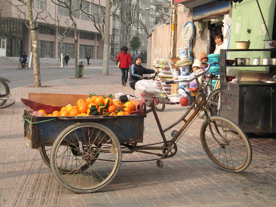 Orange Vendor Tricycle in Beijing China