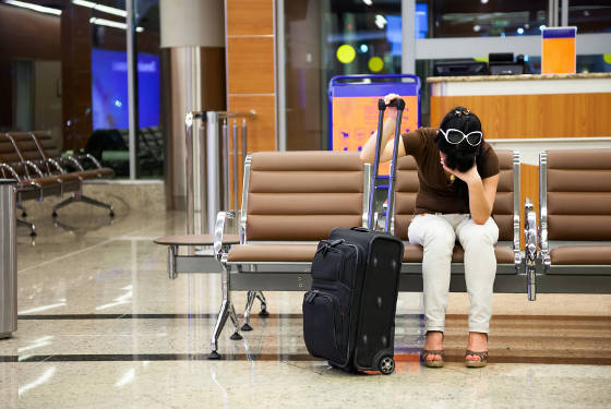 Passenger and carry-on at airport