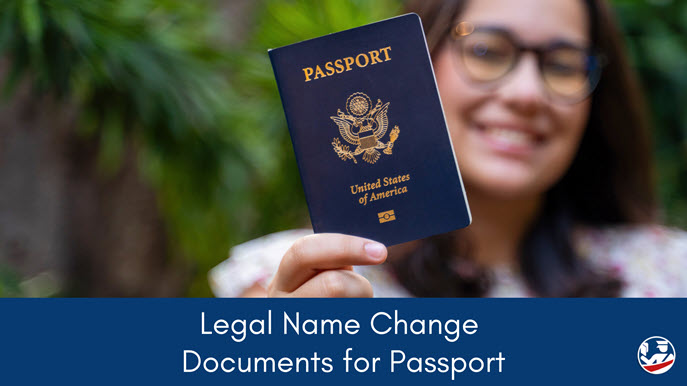 Young married woman holding up passport after name change.