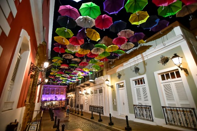 colorful umbrellas hanging over street in Puerto Rico