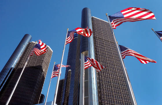 American Flags near downtown detroit buildings