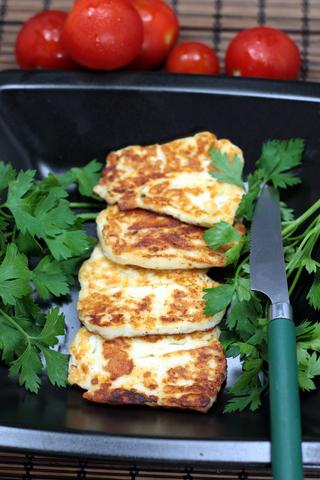 Grilled halloumi cheese with vegetables is a traditional Cypriot food that is excellent with wine. Halloumi Cheese Traditional Cypriot Food
